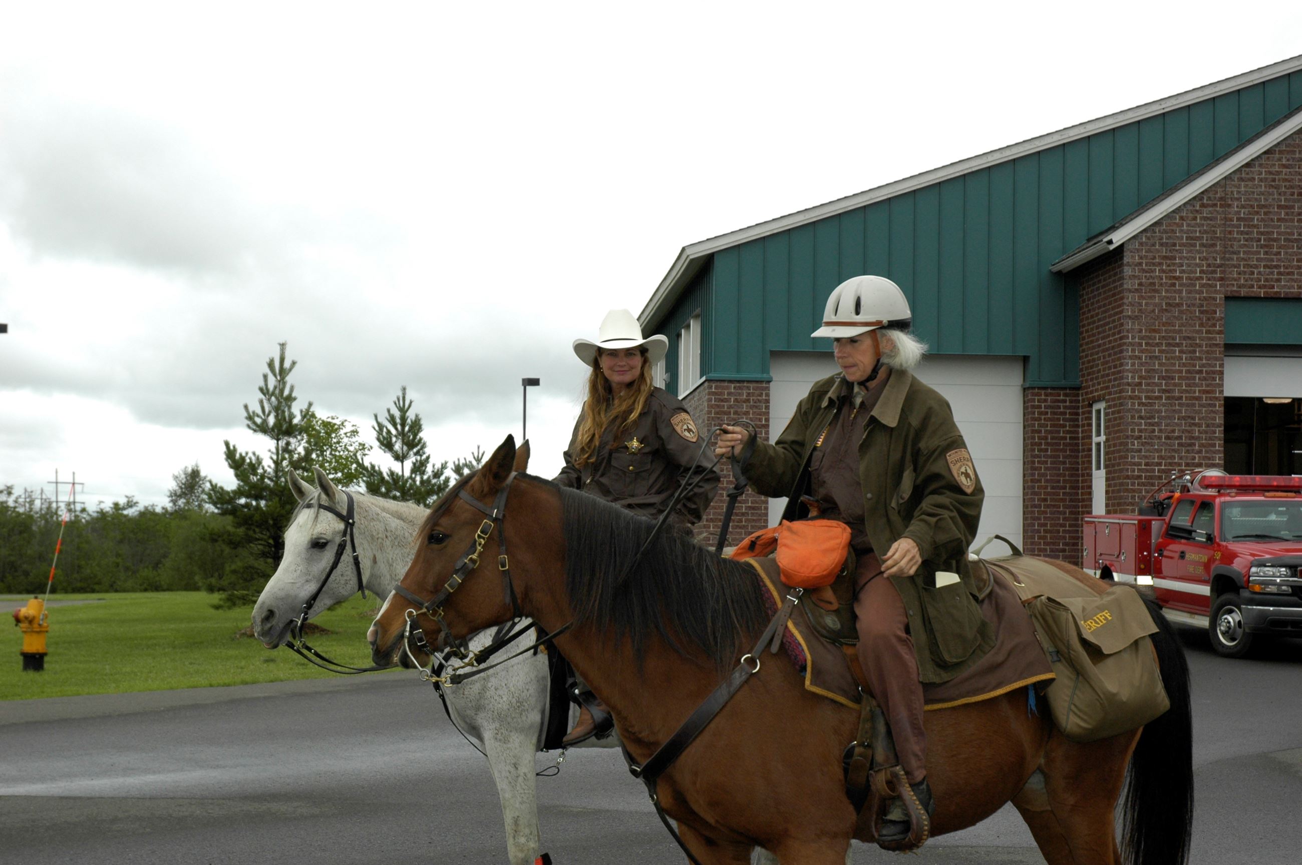 Two officers riding horses