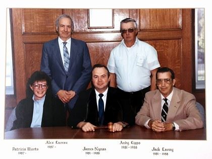 Group image of commissioners of 1980s