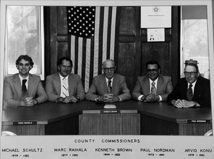 Black and white image of commissioners from 1970s to 1980s