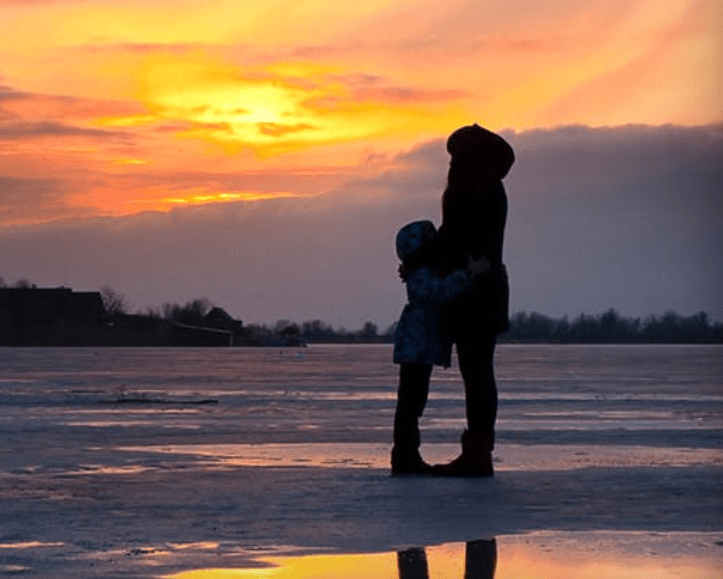 mom and kid on ice